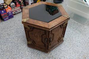 lot 367 image: Glass Top Hexagon Table with Sentry Box Bolted Inside