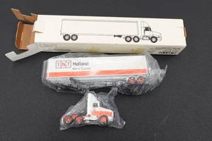 lot 379 image: Ertl TNT Holland Truck and Trailer 164 Scale Replica
