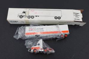 lot 380 image: Ertl TNT Holland Truck and Trailer 164 Scale Replica