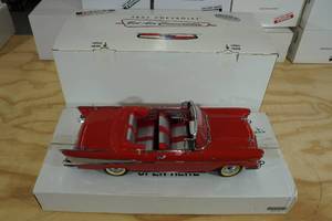 lot 25 image: Danbury Mint 1957 Chevy Bel Air Convertible 112 Scale Die Cast with Stand