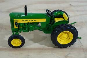lot 82 image: Ertl John Deere 330 Utility Tractor 116 Scale Replica