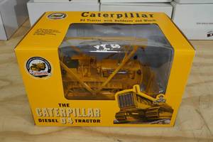 lot 100 image: The Caterpillar Diesel D4 Tractor with Bulldozer & Winch 116 Scale Replica