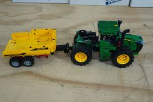lot 107 image: Lego Technic John Deere 9620R 4WD Tractor Building Set