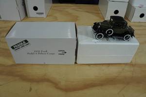 lot 111 image: Danbury Mint 1931 Ford Model A Deluxe Coupe 118 Scale Replica