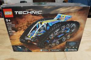 lot 128 image: Lego Technic App Controlled Transformation Vehicle 772 Piece Building Set
