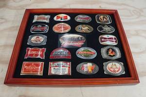 lot 141 image: 19 Framed Bradford Exchange Budweiser Belt Buckles