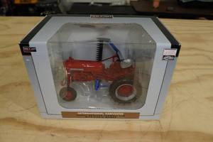 lot 191 image: Specast Farmall Cub International Harvester with Sickle Mower 116 Scale Replica