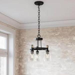 lot 16 image: Home Decorators Collection Knollwood 17-12 in. 3-Light Black Bronze with Brass Accents Industrial Round Chandelier for Kitchens Bulbs Included    Customer Returns See Pictures