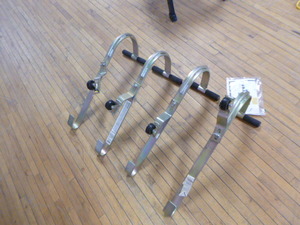 lot 65 image: 4 Roof Zone Ladder Hooks with Wheels