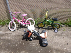 lot 151 image: Childs John Deere and Barbie Princess Bicycles and Big Wheel