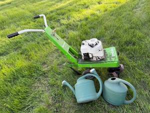 lot 99 image: Rototiller & Watering Cans
