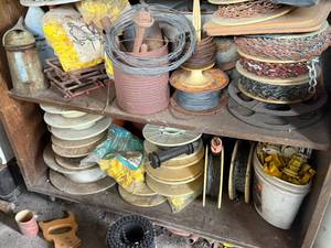 lot 220 image: Everything on 2 Shelves - Electric Fence Supplies, Chain, Wire
