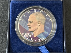 lot 87 image: Eisenhower Dollar Colorized