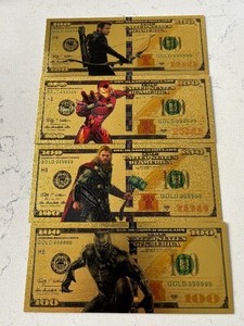 lot 116 image: 24K Gold Marvel Character $100 Dollar Bills