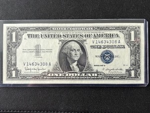 lot 117 image: 1957 B Blue Seal $1 Dollar Silver Certificate Uncirculated