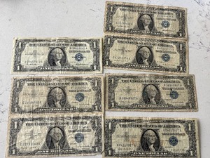 lot 118 image: 1957 Blue Seal $1 Dollar Silver Certificates