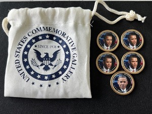 lot 96 image: Obama Dollar Coins