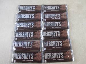 lot 69 image: (B-1) 12 Hersheys Milk Chocolate Ca...