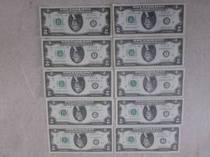 lot 99 image: (CNTR) 10 Uncirculated $2 Bills...