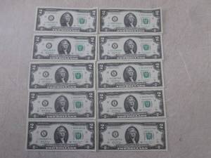 lot 101 image: (CNTR) 10 Uncirculated $2 Bills...