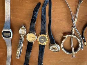 lot 158G image: Vintage watch collection with assorted bands and accessories