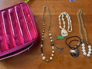 lot 161G image: Collection of Costume Jewelry Necklaces and Bracelets with Metallic Pink Bag