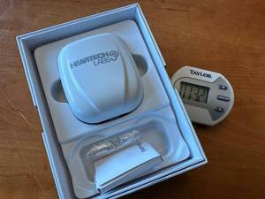 lot 163G image: HearTech Labs Hearing Aid with Timer and Cleaning Accessories