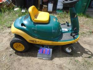 lot 107 image: Yard Bug riding mower. Consignor says it starts & does run but needs a battery & a little tlc. As shown.