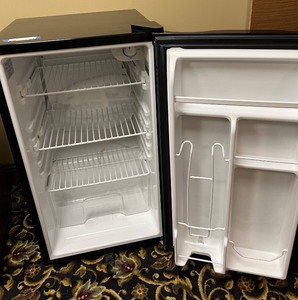 lot 54 image: GE Black Mini Refrigerator