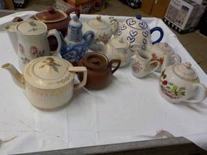 lot 172 image: Teapots...