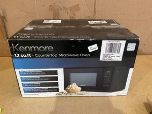 lot 56 image: Kenmore 1.1 cu ft Microwave - Black Countertop Oven, 1000W
