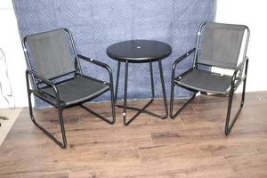lot 139 image: Set of 2 Black Metal Patio Chairs with Small Round Table