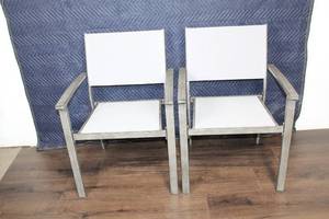 lot 140 image: Pair of Outdoor Patio Chairs with Grey Frames