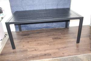 lot 144 image: Rectangular Black Metal Outdoor Dining Table with Slatted Top