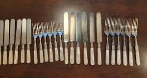 lot 45 image: Sterling Banded Mother of Pearl Handled Luncheon and Dinner Flatware Service