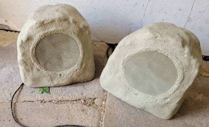 lot 90 image: Outdoor Faux Rock Stereo Speakers, pair