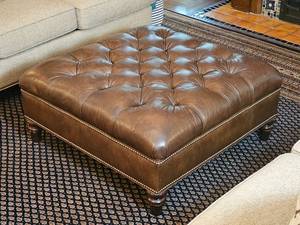 lot 22 image: Handsome Tufted Leather Ottoman with Tack Boarders