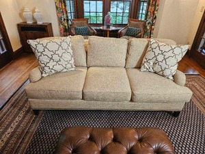 lot 24 image: At Home & Co. Tan Modern Contemporary Sofa from