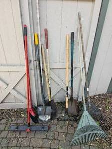 lot 107 image: Garden Tool Bundle (Rakes, Shovels, Brooms)
