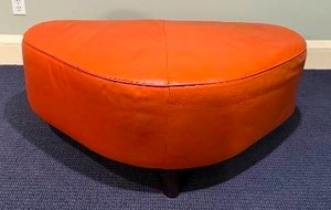 lot 59 image: Venus Cayenne Leather Wedge Ottoman