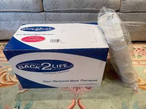 lot 8 image: Back2Life Therapeutic Massager
