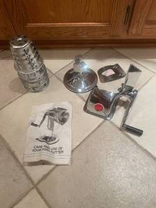 lot 29 image: King Kutter Manual Food Processor with Metal Cones