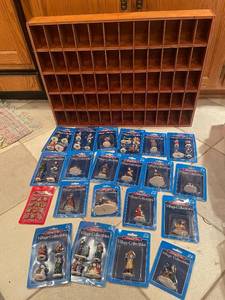 lot 47 image: Set of 20 Holiday Time Village Collectibles Figurines with Display Shelf