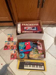 lot 53 image: Assorted Toy and Game Collection with Keyboard and Books
