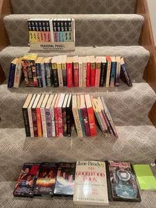 lot 60 image: Collection of Assorted Paperback Books, VHS Tapes, and Craft Guides