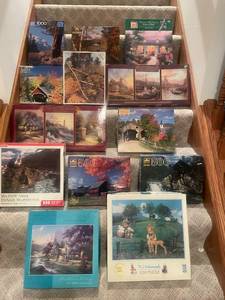 lot 62 image: Collection of 13 Assorted Jigsaw Puzzles including Thomas Kinkade Designs