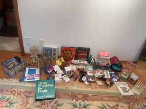 lot 116 image: Diverse Collection of Home Decor, Books, and Accessories