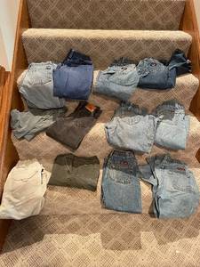 lot 176 image: Collection of 13 Kids Jeans in Various Colors and Styles