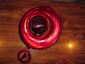lot 584 image: Cardinal wind spinner...