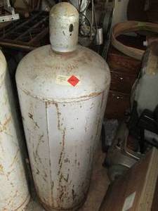 lot 590 image: Empty 100lb Propane Cylinder...